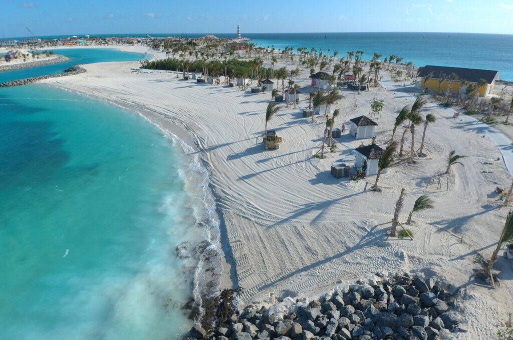 Ocean Cay beach with rock revetment and cabanas