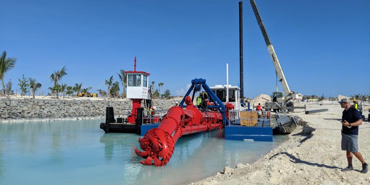 Dredge working along the Ocean Cay shore